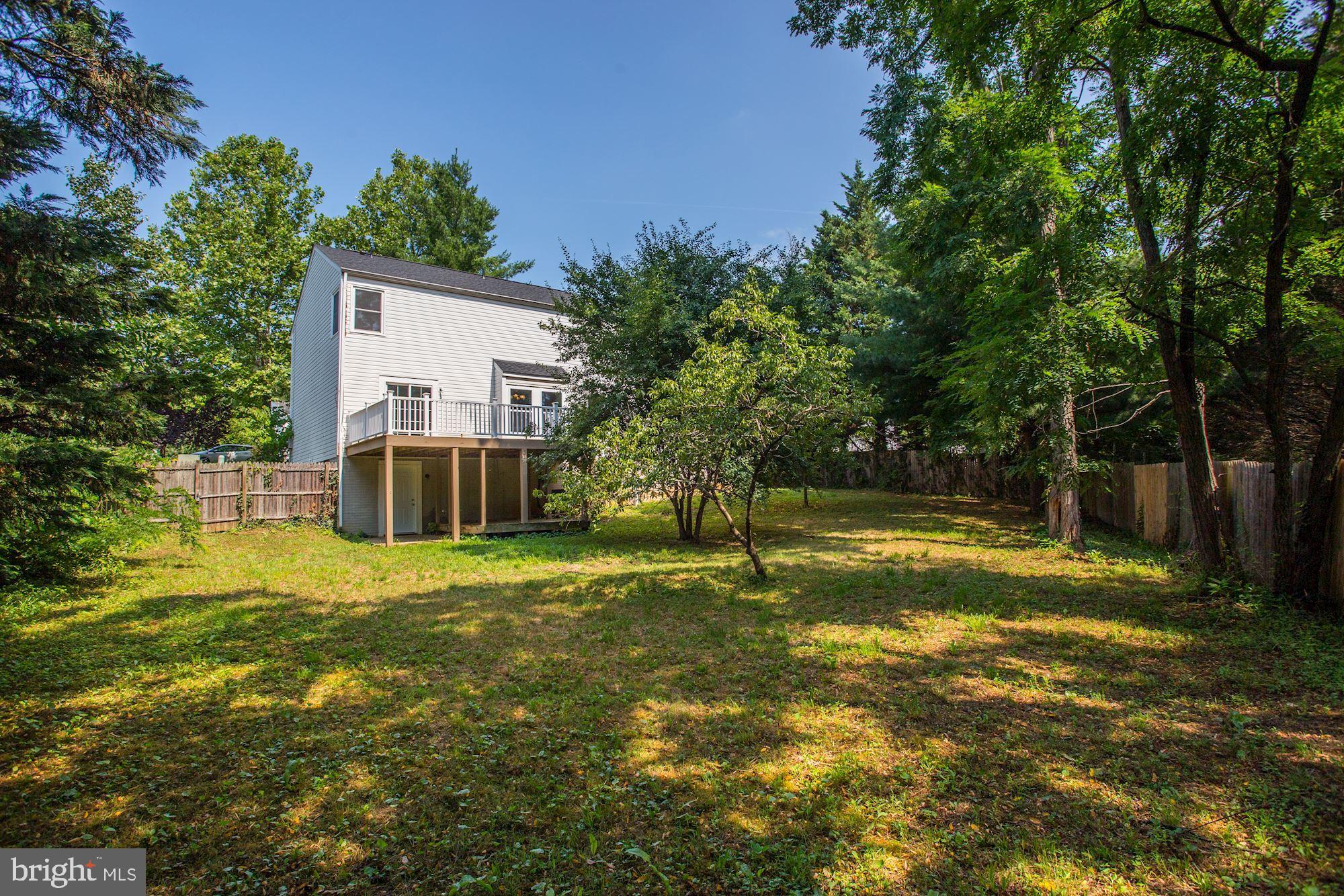 3909 Red Leaf Court Point of Rocks, MD 21777 - Photo 8 of 10 a view of a house with a yard and basketball court