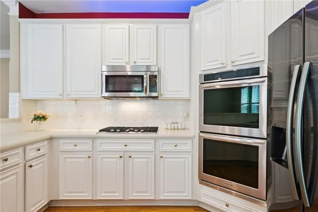 a bathroom with a bathtub and a sink