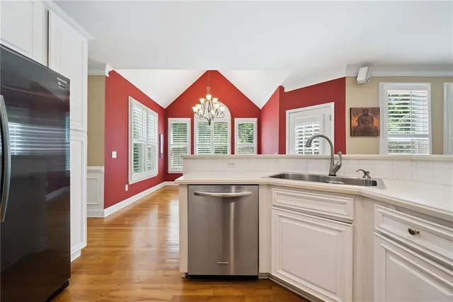 a bathroom with a bathtub and a toilet