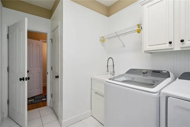 a view of a hallway with wooden shelves
