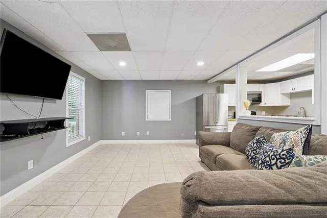 a view of a patio with a table and chairs