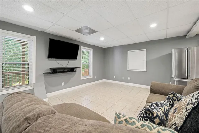 a backyard of a house with wooden floor