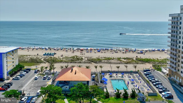 a sign board with a small yard and wooden fence