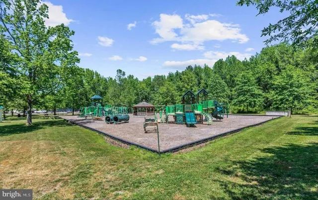 a view of a street with a yard