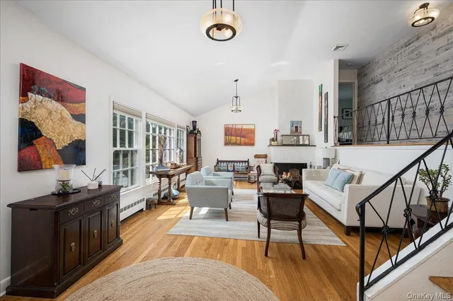 a living room with furniture and a table