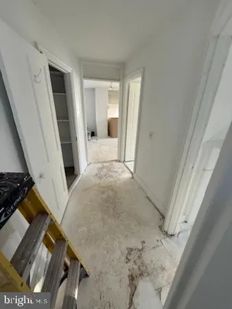 a room with furniture and a window