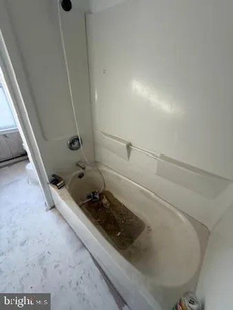 a view of balcony with wooden floor