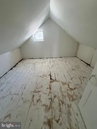 a view of a livingroom with furniture and windows