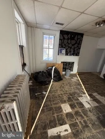 a kitchen with a stove and a refrigerator