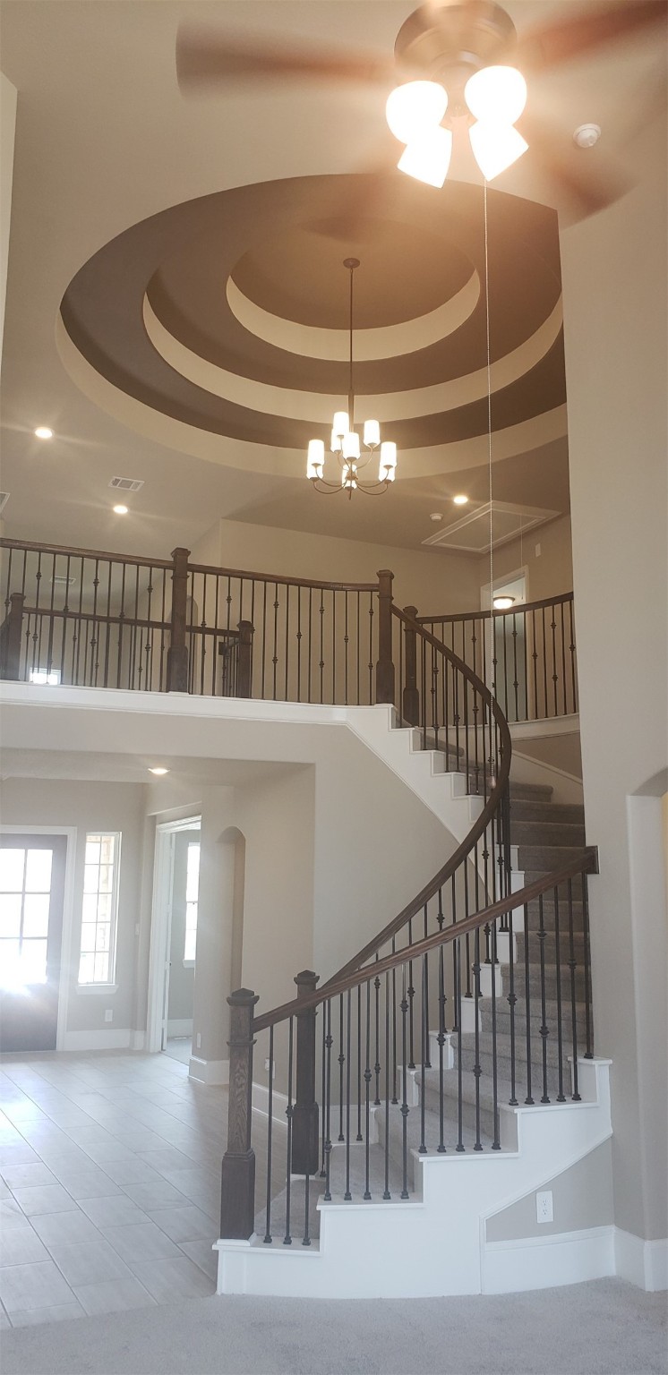 17501 Spice Merlot Lane Conroe, TX 77302 - Photo 2 of 6 a view of entryway and hall with wooden floor
