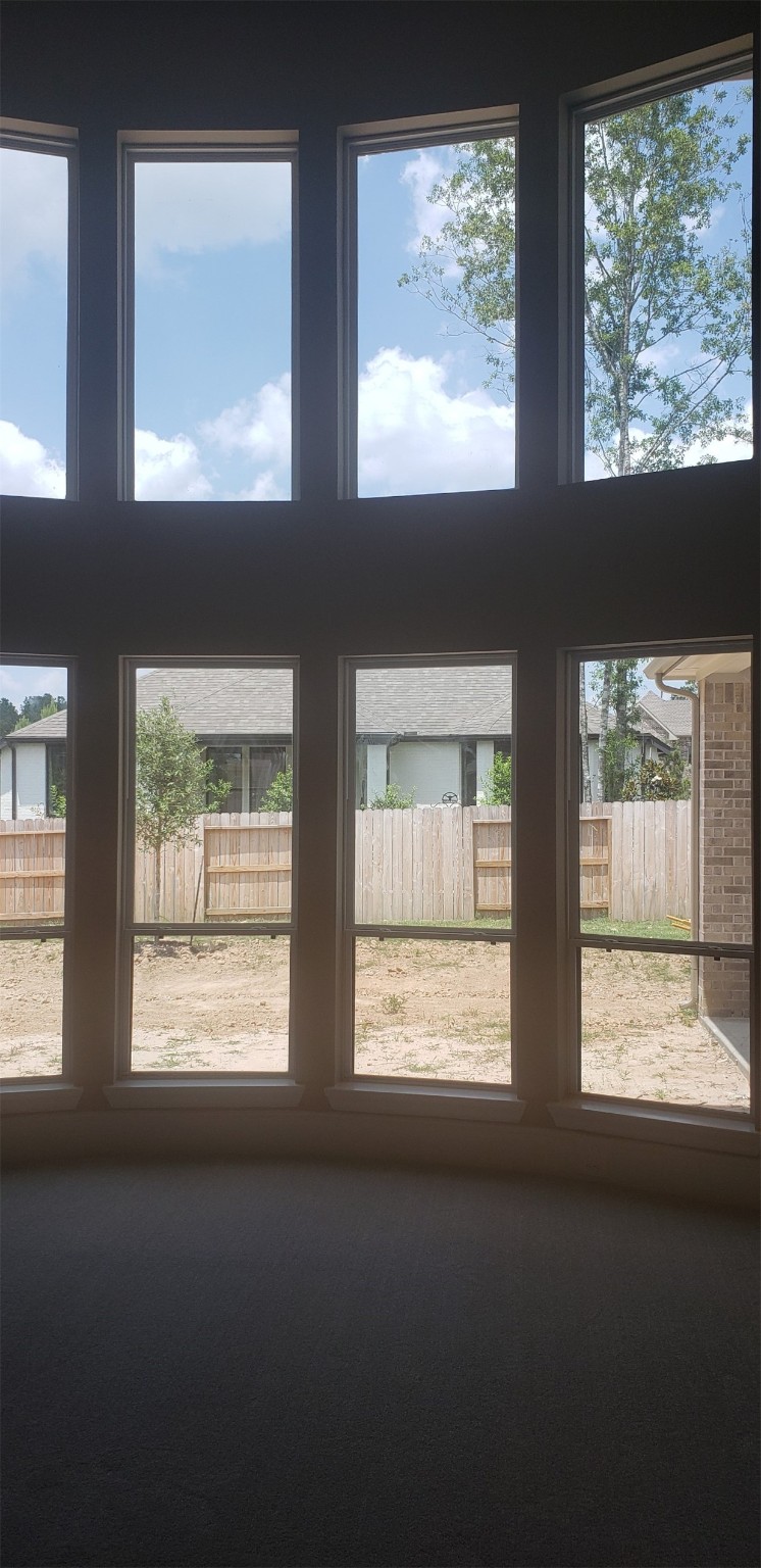 17501 Spice Merlot Lane Conroe, TX 77302 - Photo 6 of 6 a view of an empty room with a window