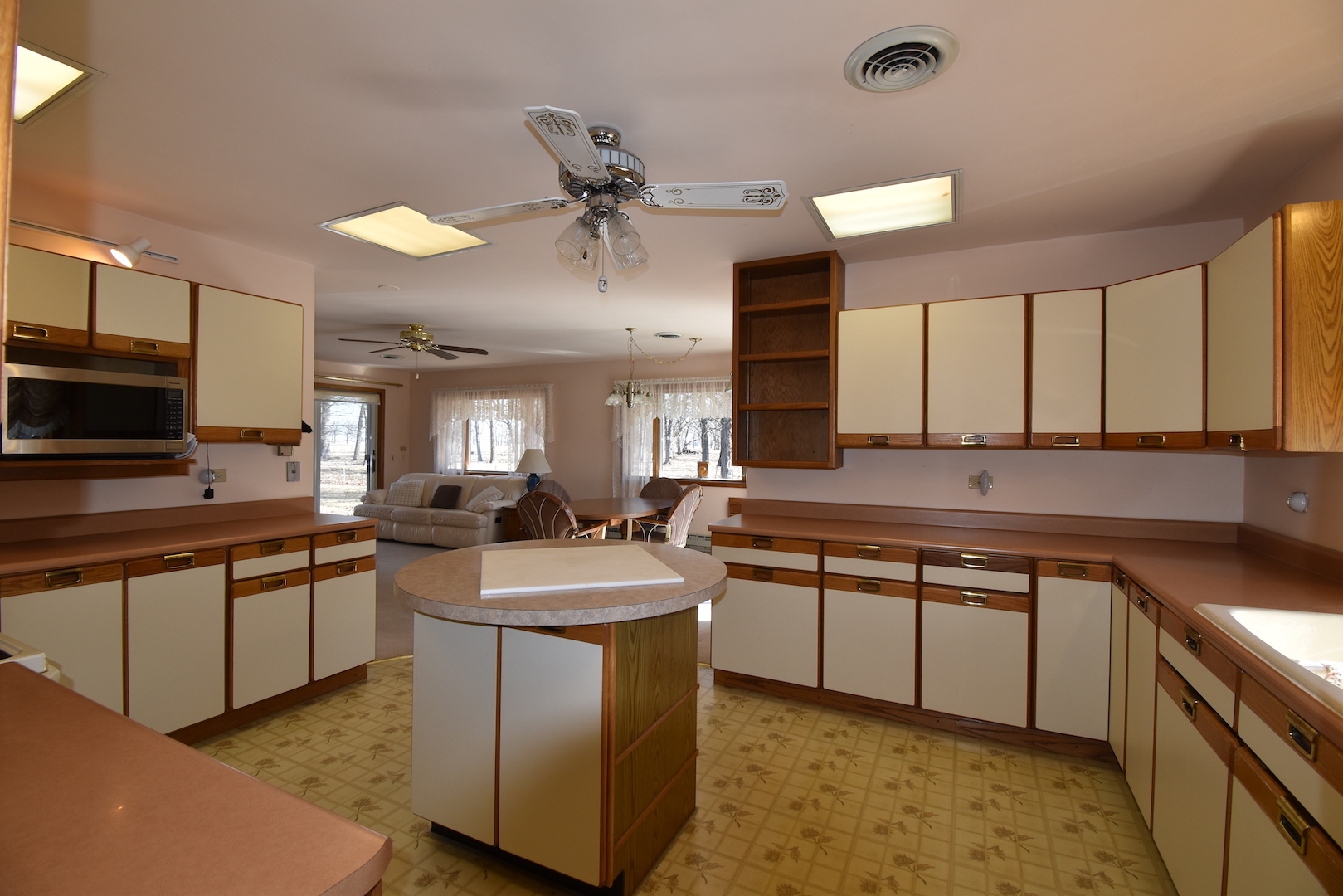 4496 West Sandwich Road Sandwich, IL 60548 - Photo 11 of 37 a kitchen with stainless steel appliances granite countertop a sink stove and cabinets