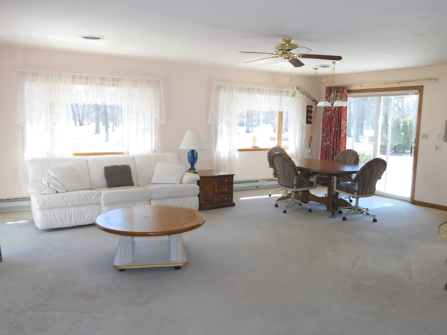4496 West Sandwich Road Sandwich, IL 60548 - Photo 14 of 37 a living room with furniture and a large window