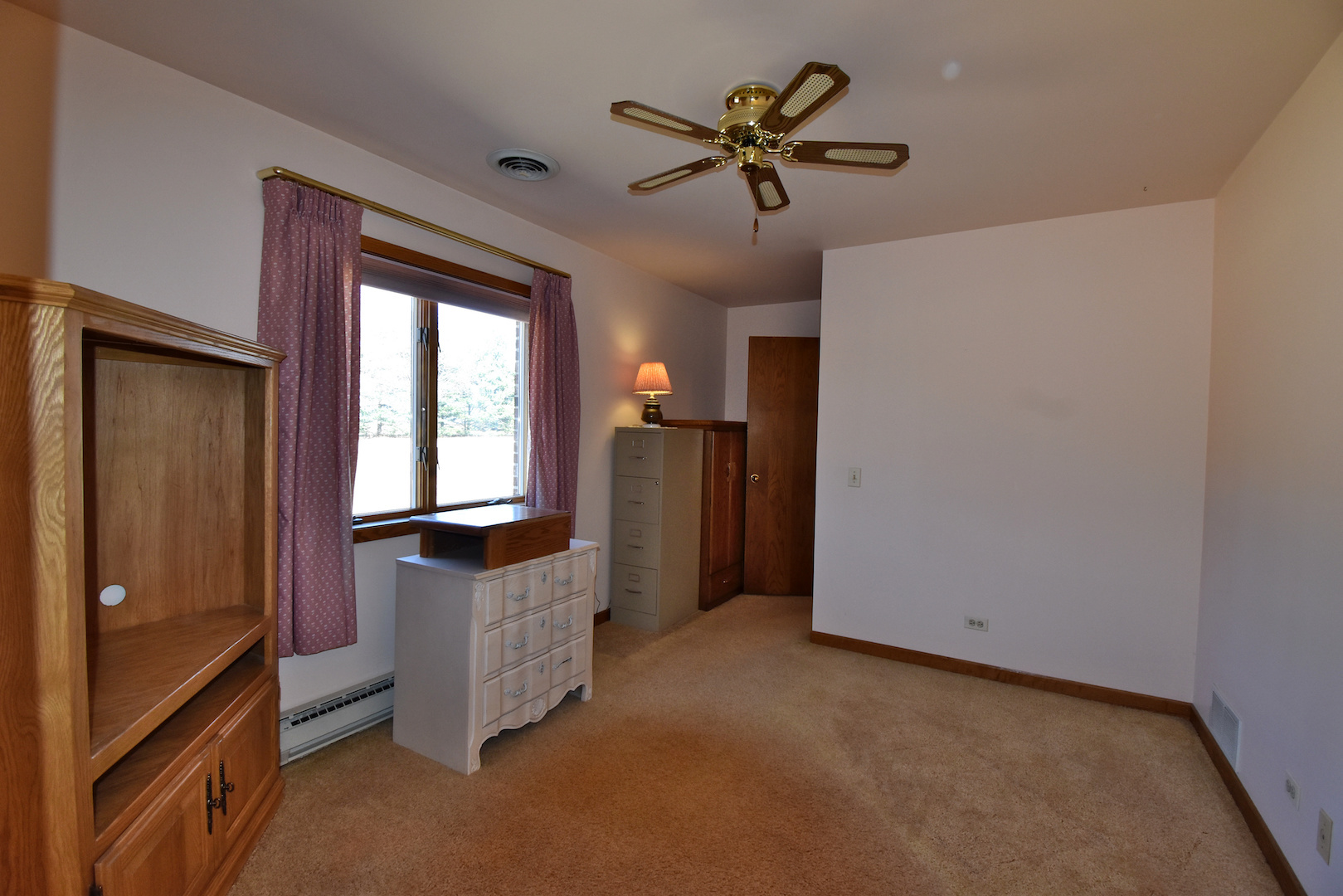 4496 West Sandwich Road Sandwich, IL 60548 - Photo 23 of 37 a view of an empty room with a window