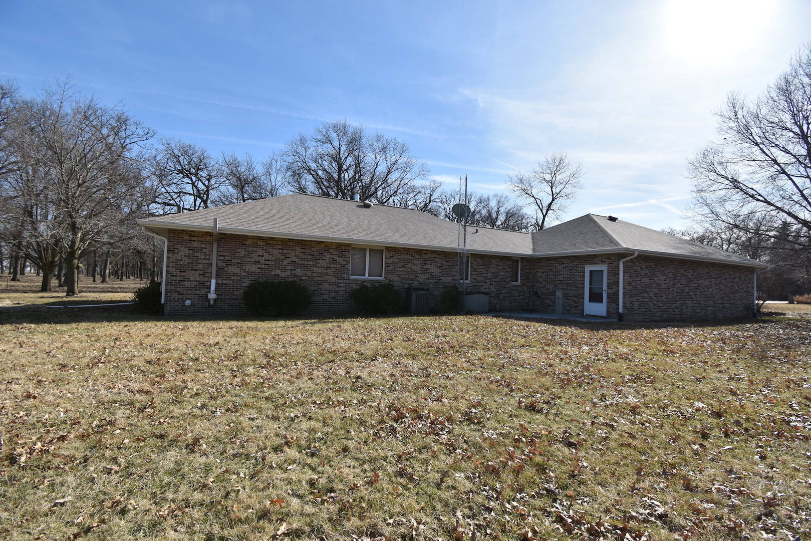 4496 West Sandwich Road Sandwich, IL 60548 - Photo 27 of 37 a front view of a house with a yard