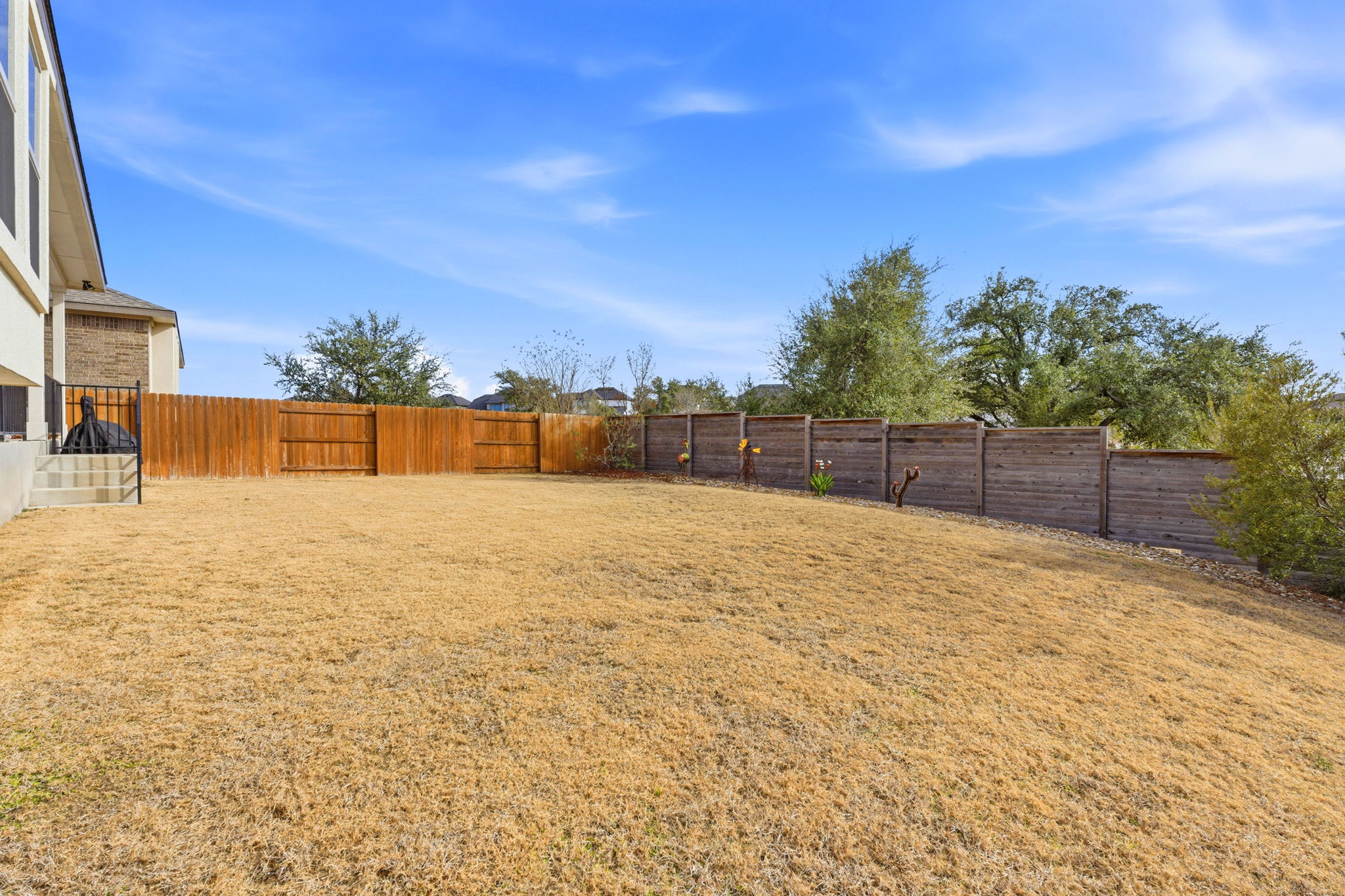 18917 Grape Seed Cove Austin, TX 78738 - Photo 29 of 33 View of fenced backyard