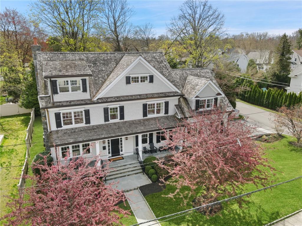 131 Florence Avenue Rye, NY 10580 - Photo 1 of 1 a front view of a house with a garden