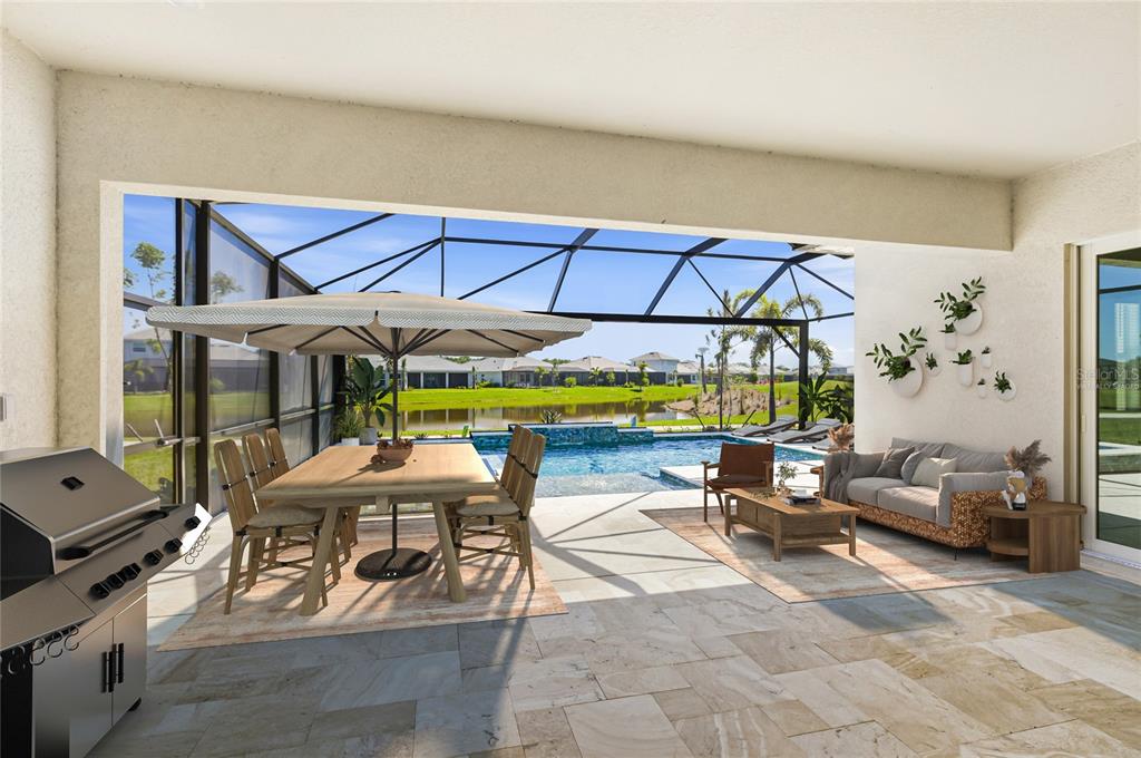 19156 Cherrystone Way Lakewood Ranch, FL 34211 - Photo 26 of 49 a view of patio with a table and chairs under an umbrella