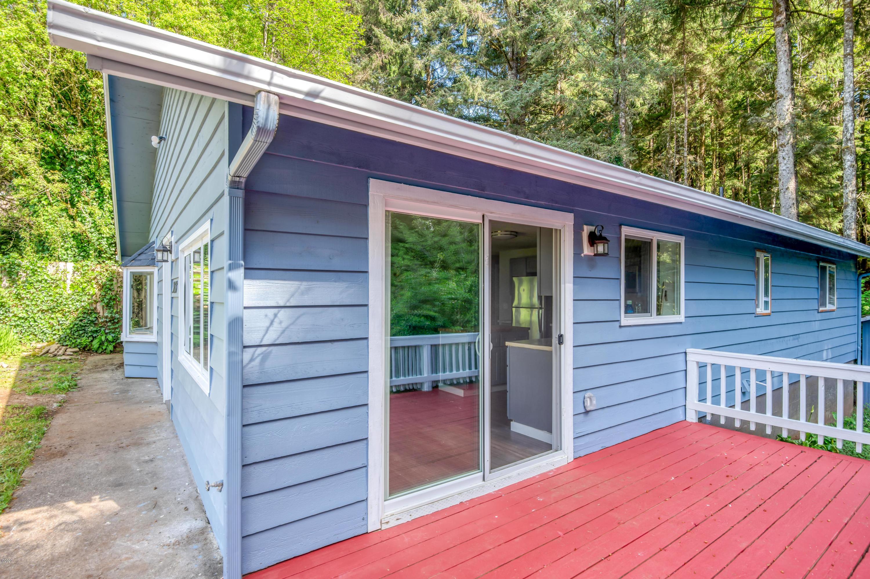 3038 Northeast East Line Road Yachats, OR 97498 - Photo 1 of 24 a view of front door of the house