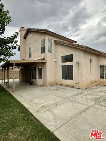 a front view of a house with a garage