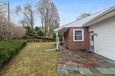 a view of a backyard with a garden