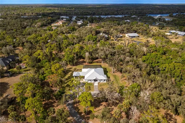 an aerial view of residential house with parking space