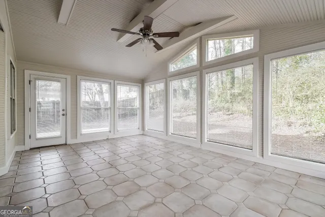 a view of an empty room and window