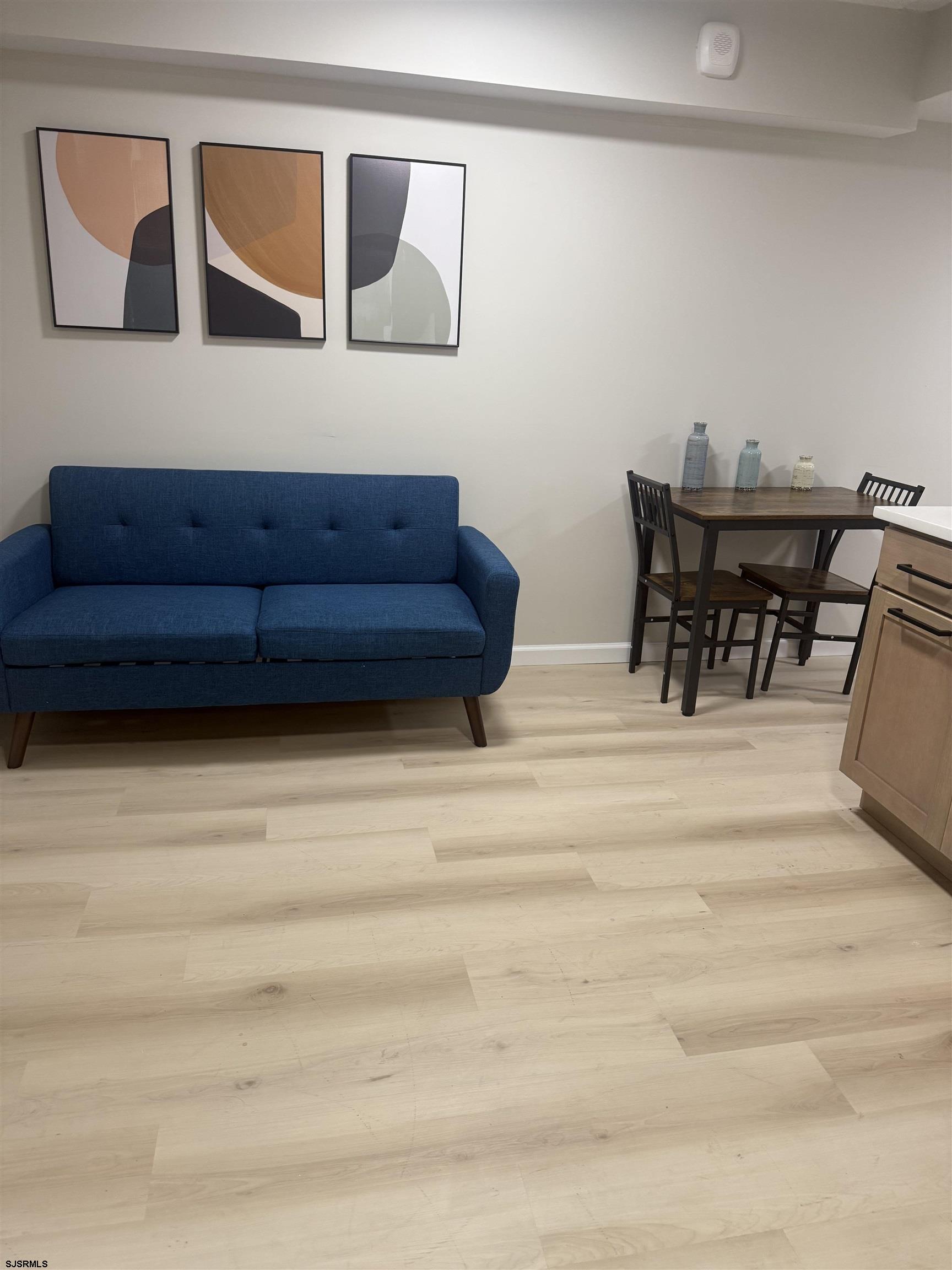 2580 Tilton Road, Unit 112 MODEL Egg Harbor Township, NJ 08234 - Photo 12 of 15 a living room with furniture and a piano
