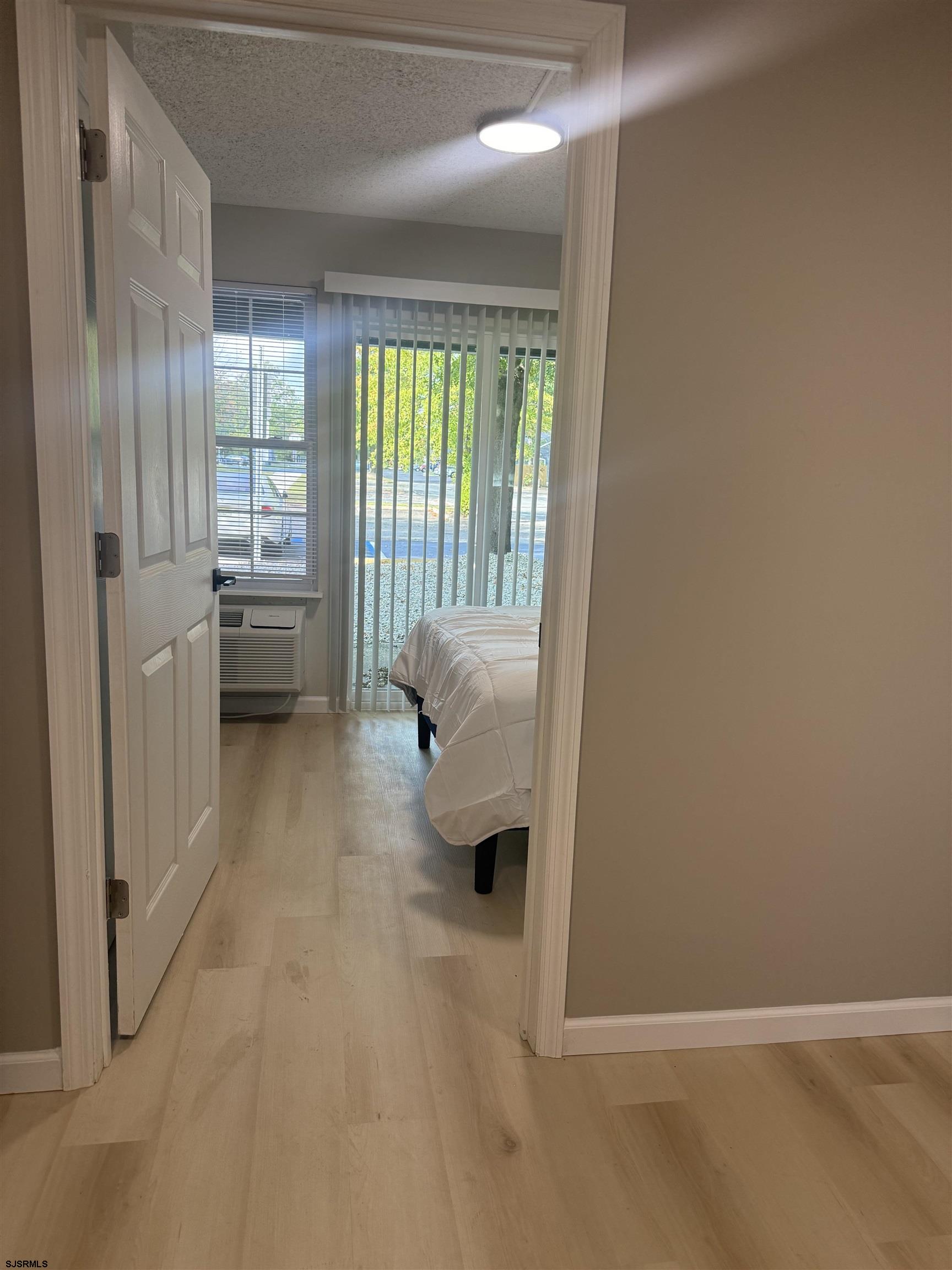 2580 Tilton Road, Unit 112 MODEL Egg Harbor Township, NJ 08234 - Photo 14 of 15 a room with furniture and a large window
