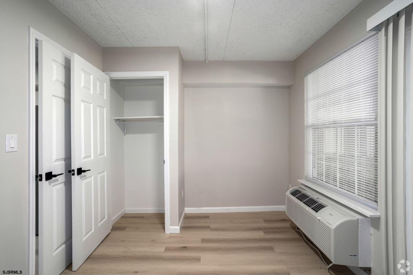 2580 Tilton Road, Unit 112 MODEL Egg Harbor Township, NJ 08234 - Photo 9 of 15 a view of an empty room and a window