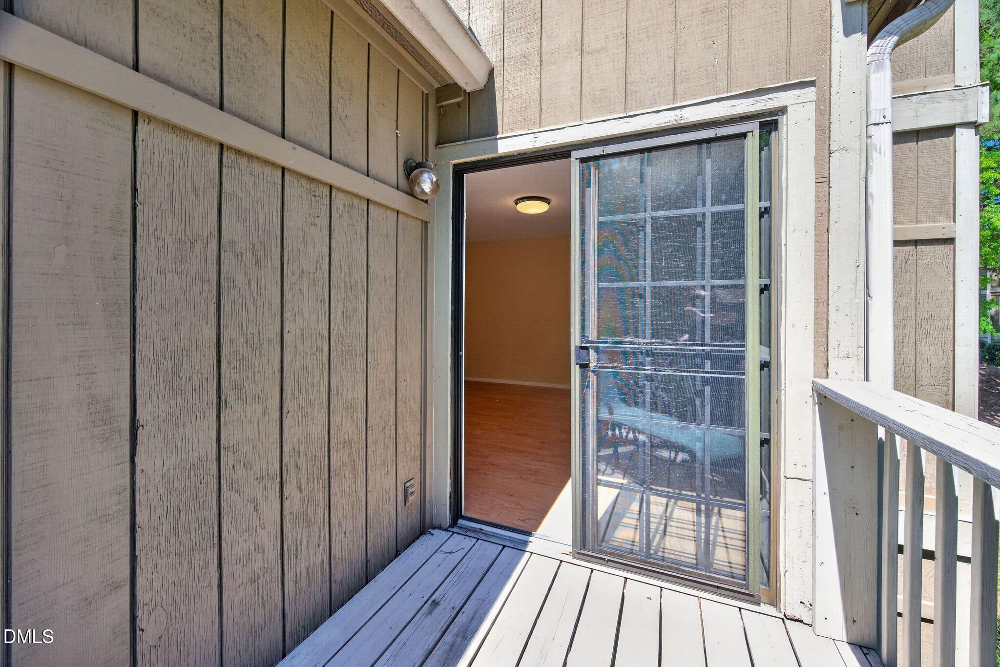 3704 Chimney Ridge Place, Unit 207 Durham, NC 27713 - Photo 21 of 31 a view of outdoor space with wooden floor and entrance