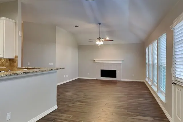a view of a livingroom with a fireplace