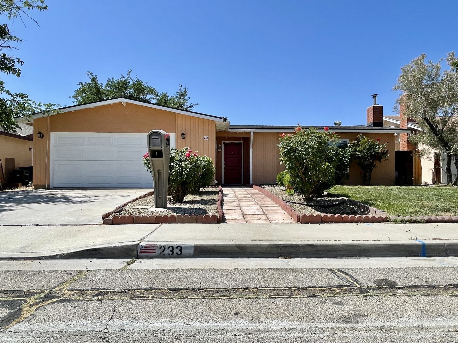 233 West St George Avenue Ridgecrest, CA 93555 - Photo 45 of 47 a view of a house with a street