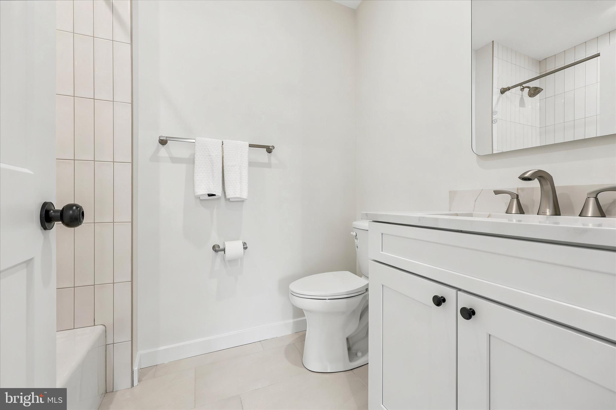 8 James Road Broomall, PA 19008 - Photo 26 of 35 a bathroom with a toilet sink and shower