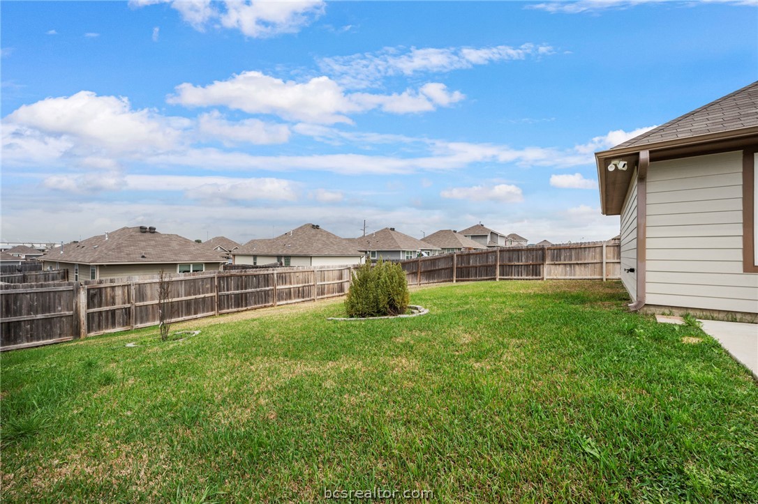 303 Camp Bowie Road Caldwell, TX 77836 - Photo 5 of 25 a view of a garden with a building in the background