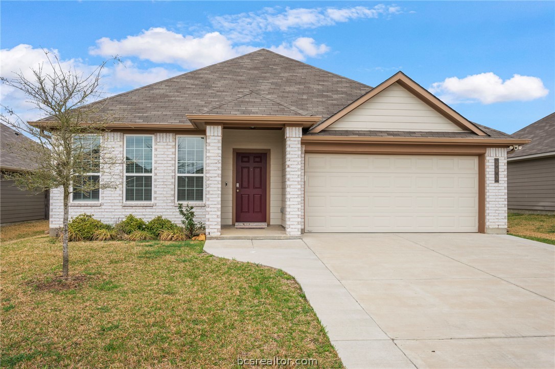 303 Camp Bowie Road Caldwell, TX 77836 - Photo 7 of 25 a front view of a house with a garden and plants