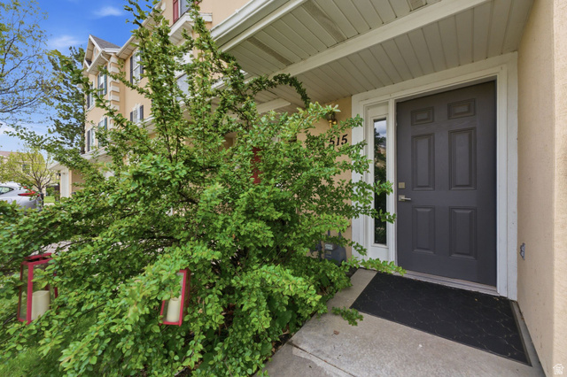 515 Inverness Lane, Unit 207 Heber City, UT 84032 - Photo 21 of 26 Doorway to property featuring stucco siding