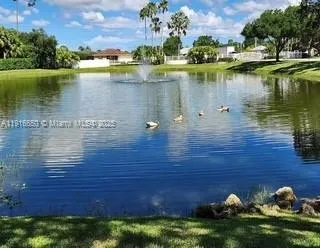 a view of a lake with houses