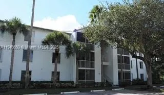 a front view of a building with street view