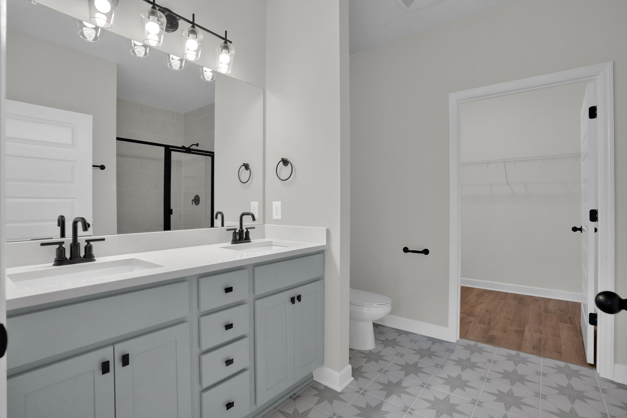 159 Rothwood Pvt Drive Hendersonville, TN 37075 - Photo 17 of 33 a bathroom with a granite countertop sink a toilet and a mirror