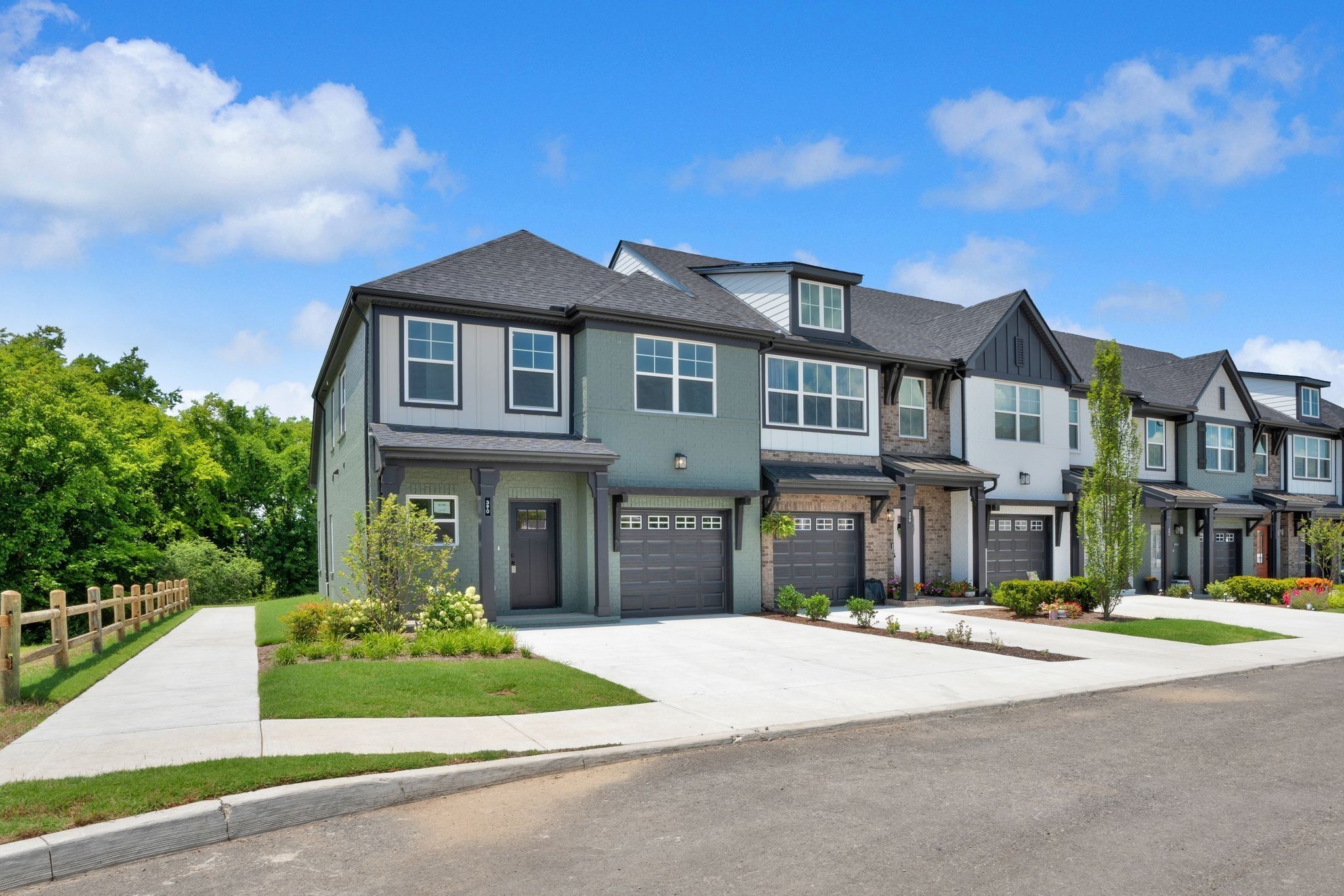 159 Rothwood Pvt Drive Hendersonville, TN 37075 - Photo 2 of 33 a front view of a house with a garden