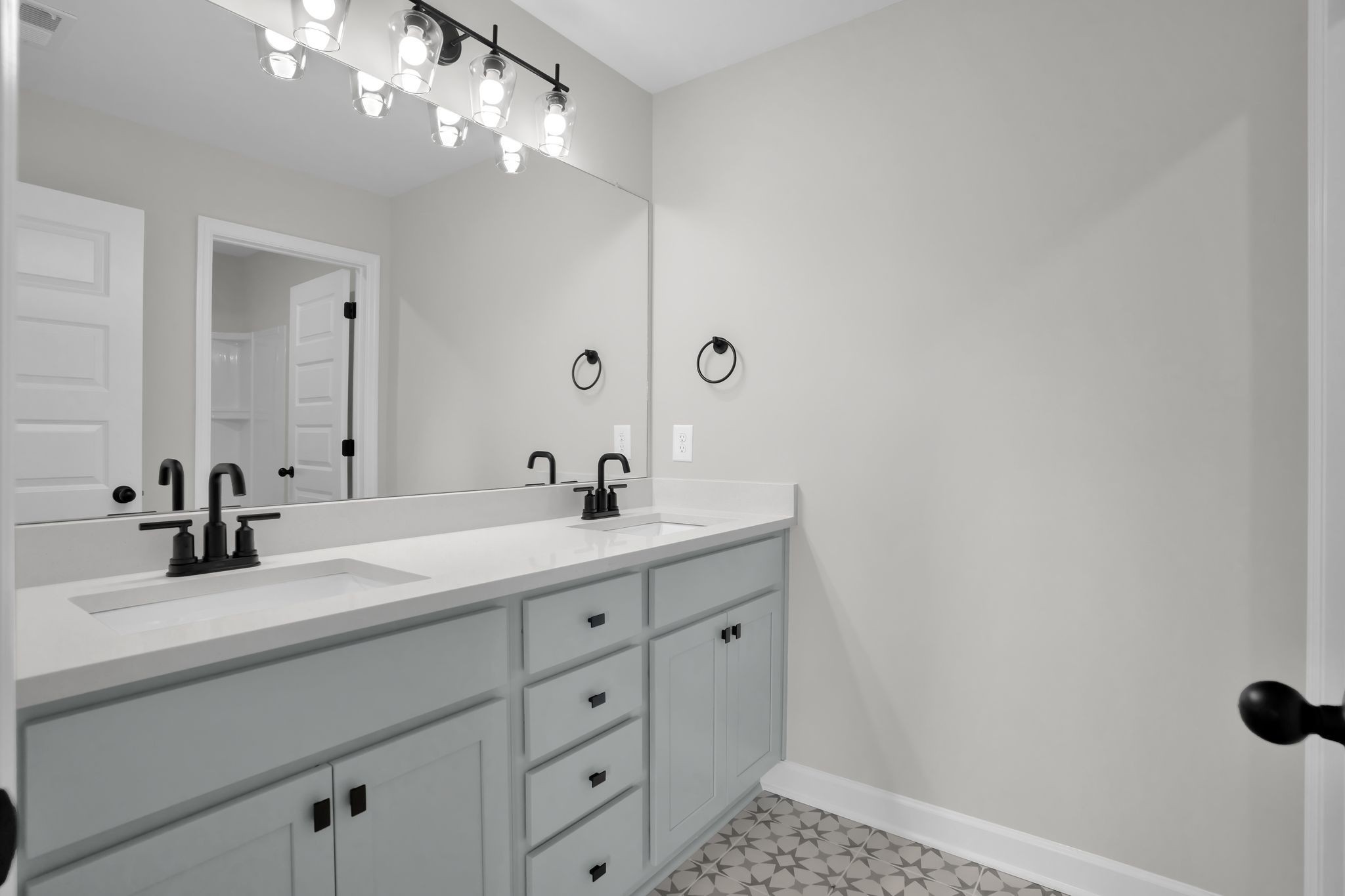 159 Rothwood Pvt Drive Hendersonville, TN 37075 - Photo 27 of 33 a bathroom with a sink a light fixture and a mirror