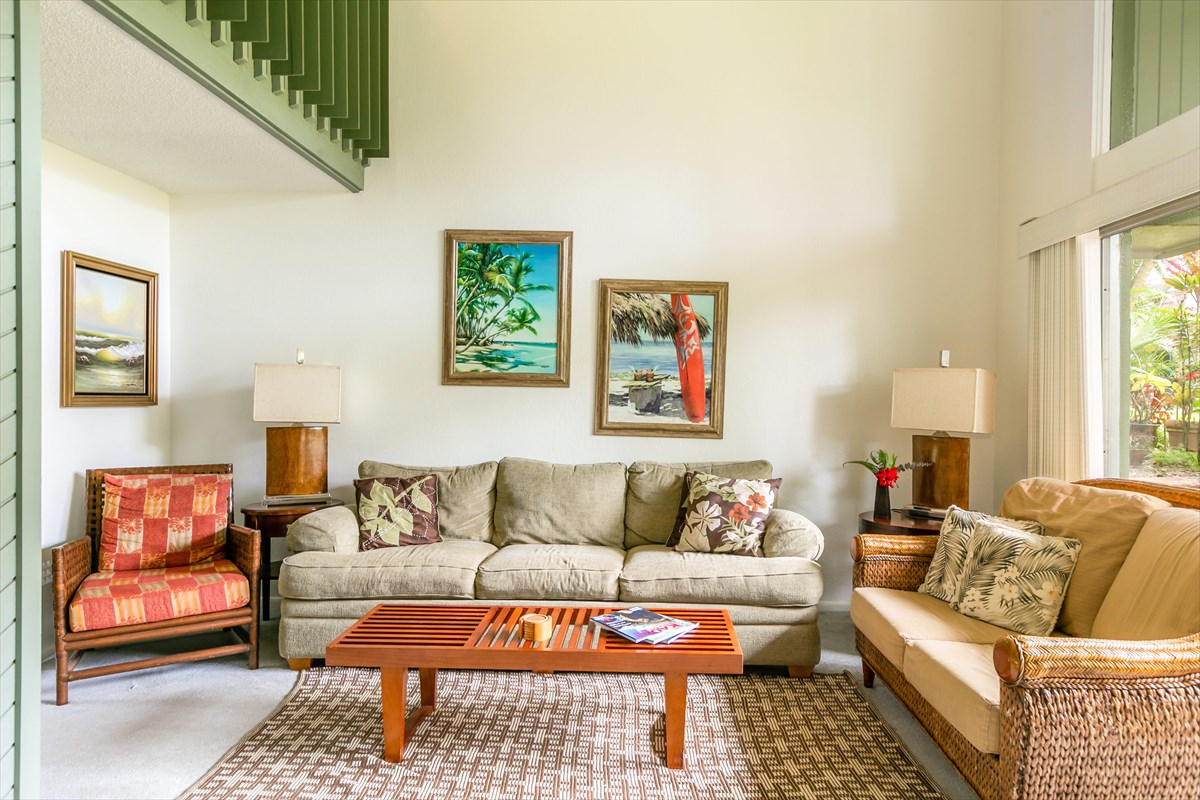 3880 Wyllie Road, Unit 8C Princeville, HI 96722 - Photo 3 of 17 a living room with furniture and a couch