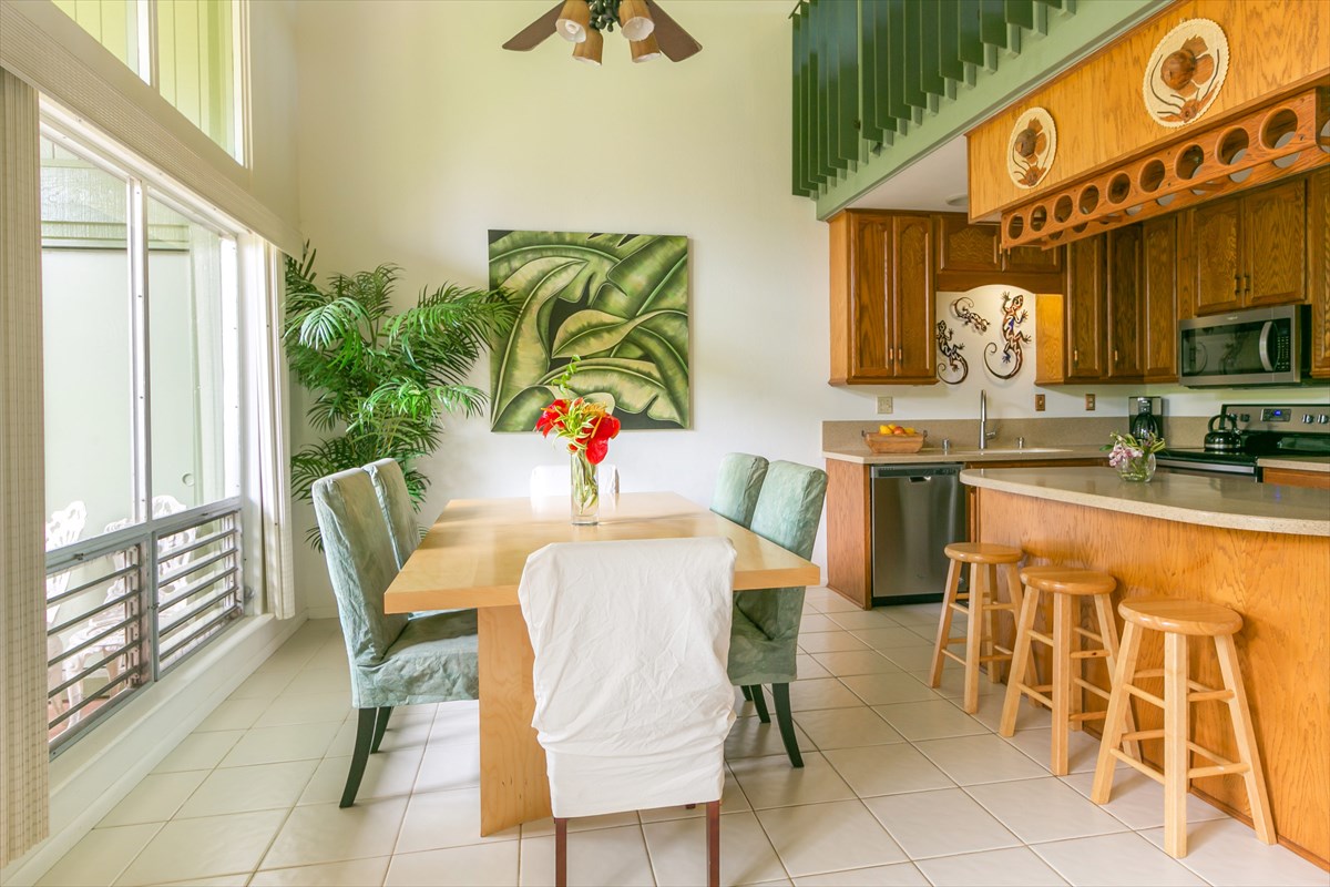 3880 Wyllie Road, Unit 8C Princeville, HI 96722 - Photo 7 of 17 a view of a dining room with furniture