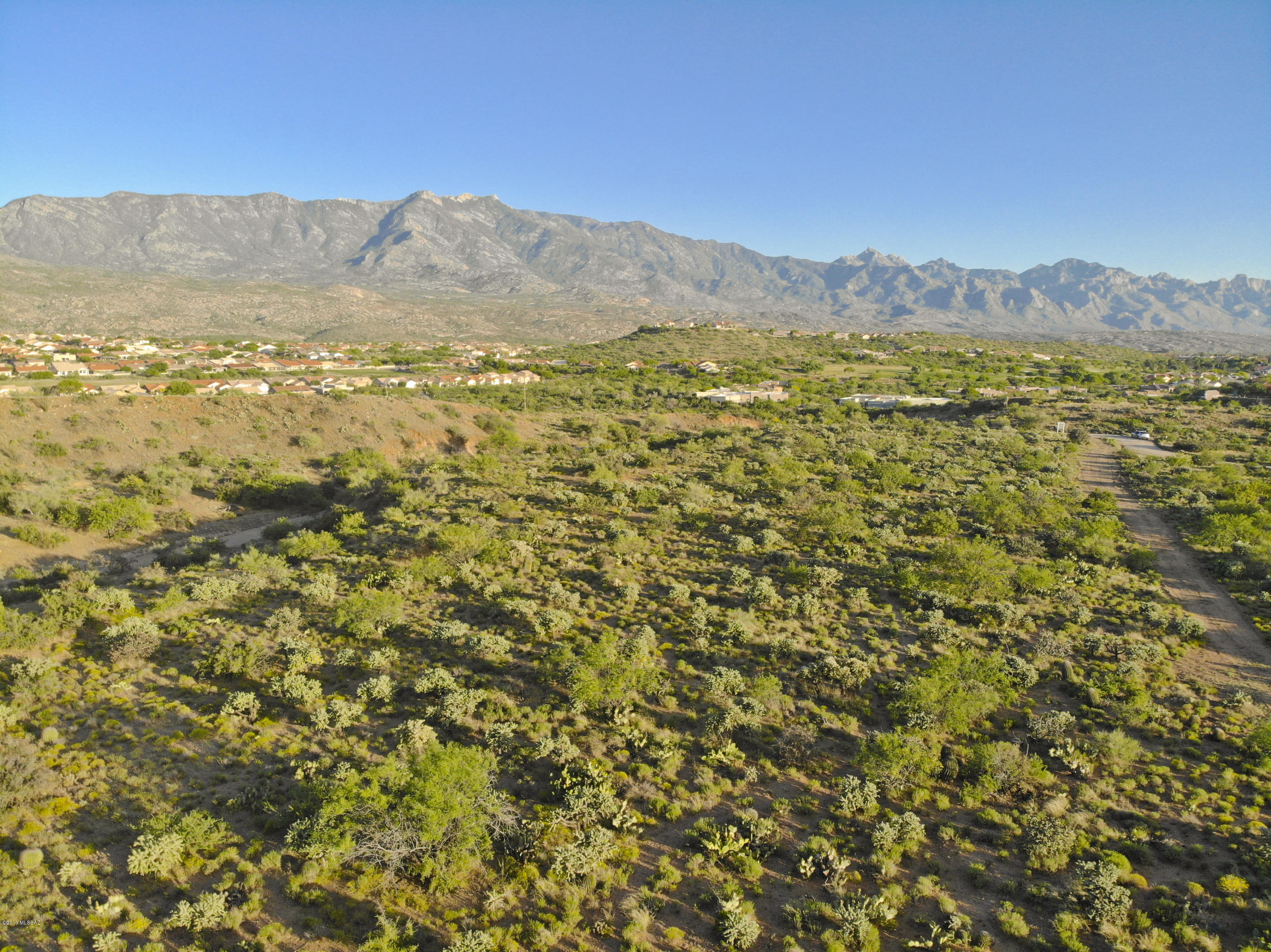 0 East Horseshoe Bend Road, Unit B Tucson, AZ 85739 - Photo 3 of 8 This angle shows well the access to the property on the west side and the protection & privacy afforded by the wash on the east side.