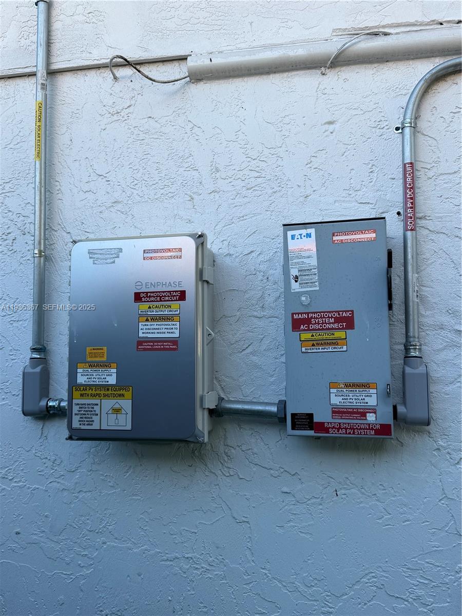 15022 Southwest 67th Lane Miami, FL 33193 - Photo 23 of 34 a car parked on the side of a road