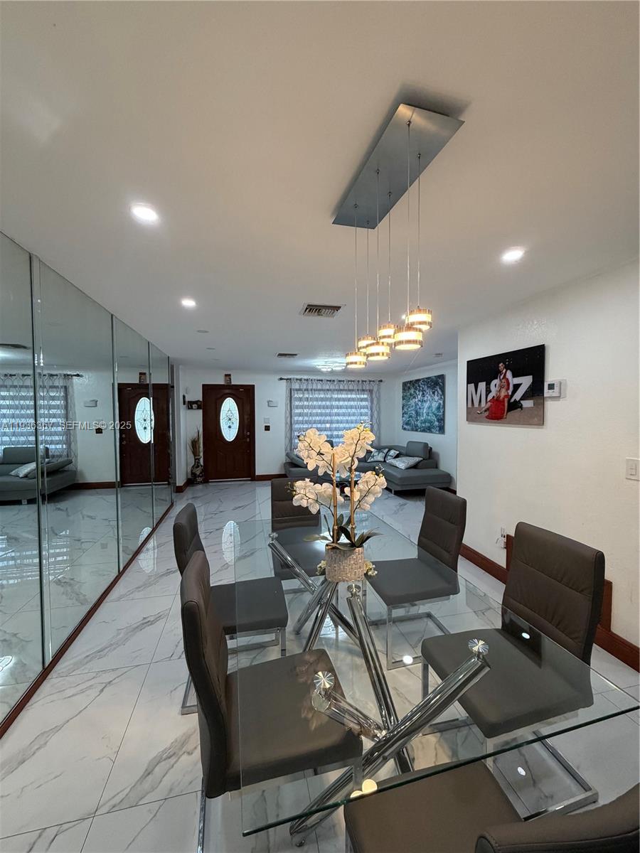 15022 Southwest 67th Lane Miami, FL 33193 - Photo 25 of 34 a living room with furniture