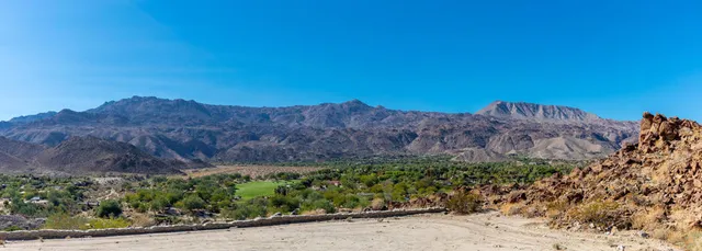 a view of mountains and valleys