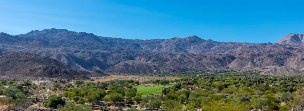 702 Summit Palm Desert, CA 92260 - Photo 7 of 8 a view of a lush green field