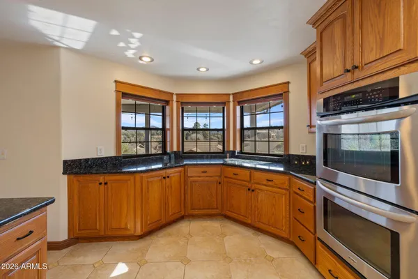 a view of a livingroom with wooden floor